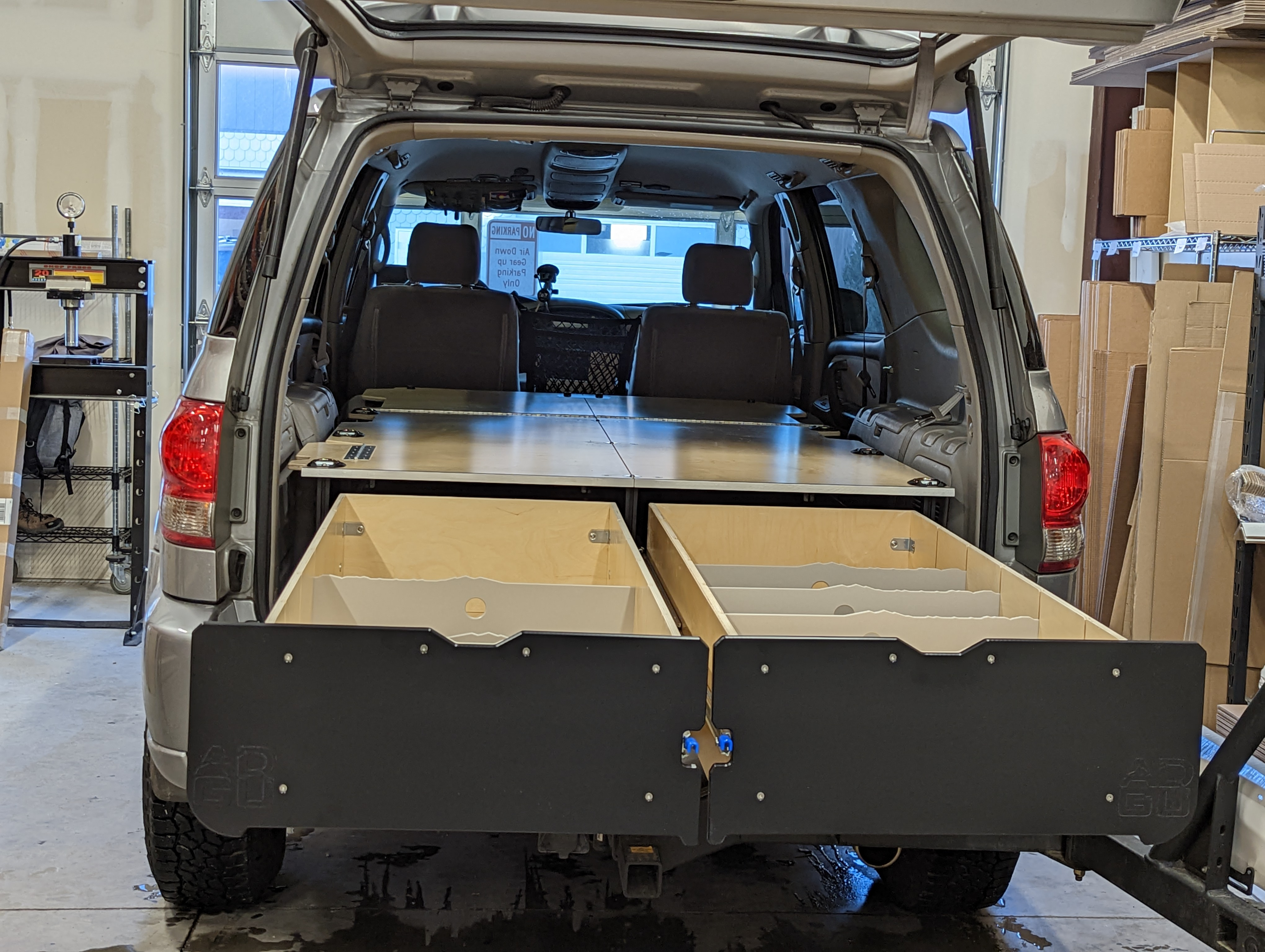 Toyota Sequoia drawer system with sleeping platform for vehicle organization