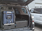 Toyota 4Runner Kitchen, Fridge Slide , work surface, storage drawers and sleeping platform . Organization for overland adventure.