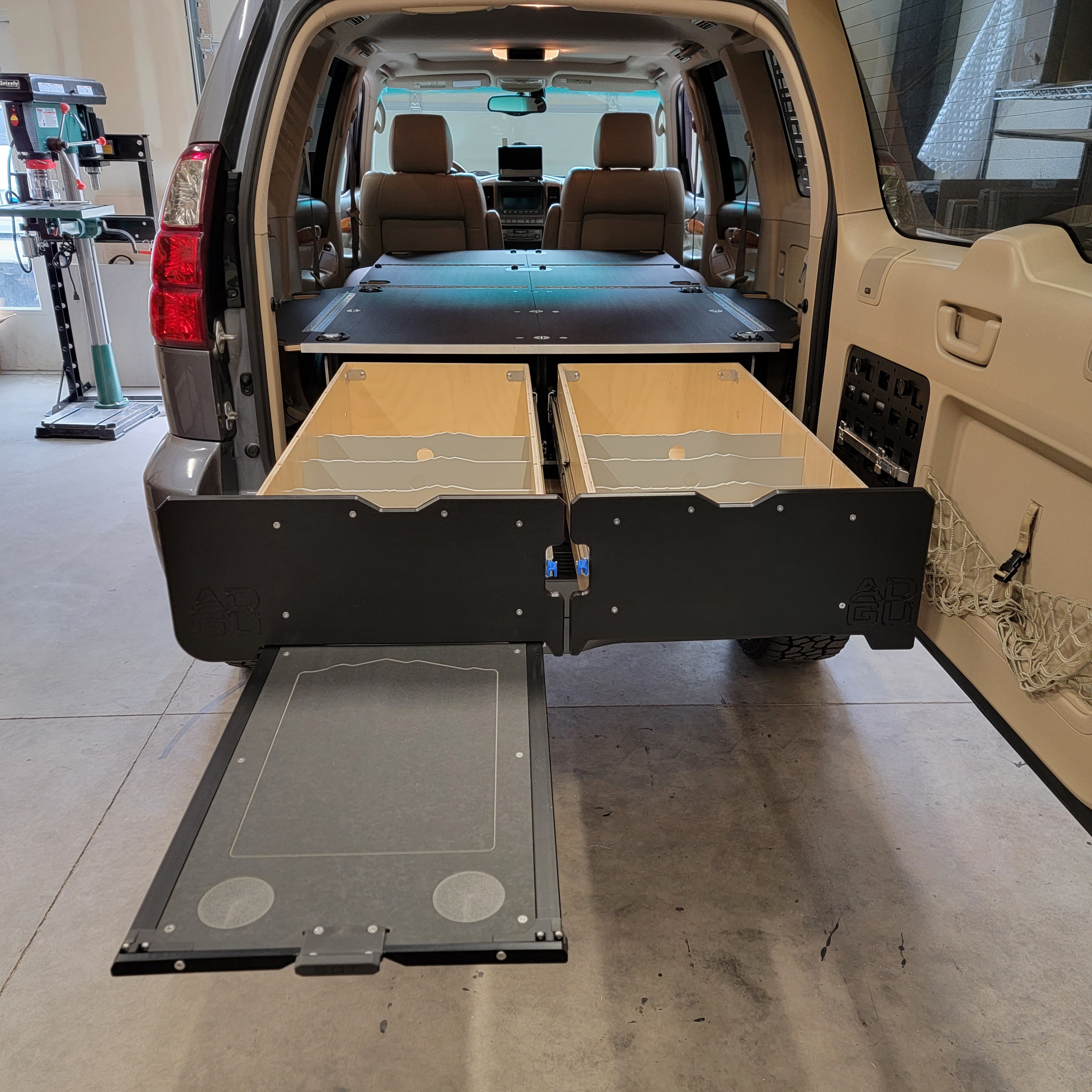GX470 drawer system with sleeping platform for vehicle organization
